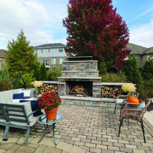 Brick patio with fireplace